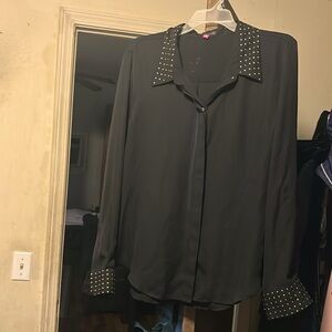 Lightly see threw button blouse great to wear over a tank or alone